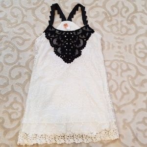 Super cute sleeveless dress.